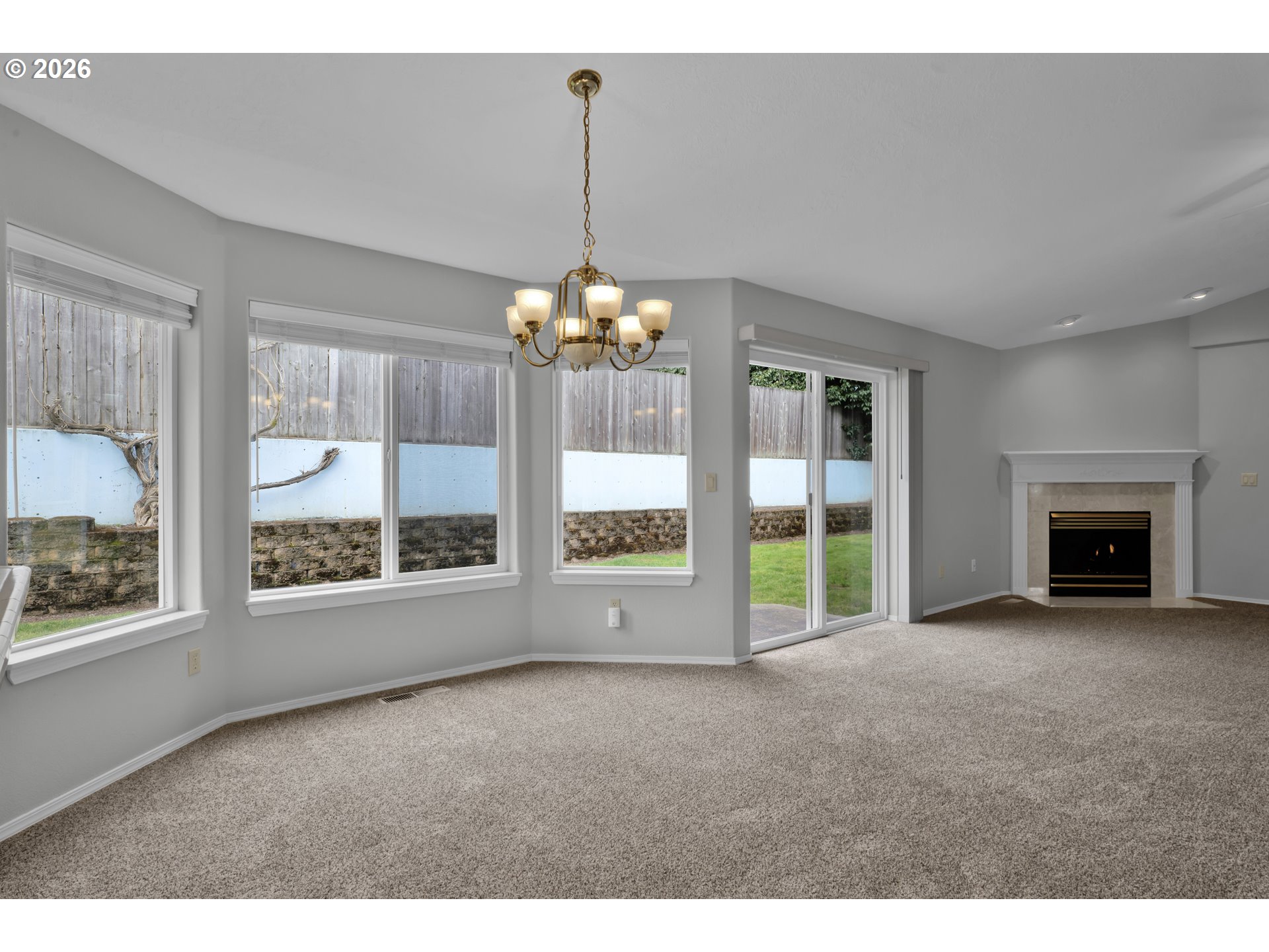 4159 Kurth Street South Salem, OR 97302 - Photo 11 of 37 a view of an empty room with window and fire place