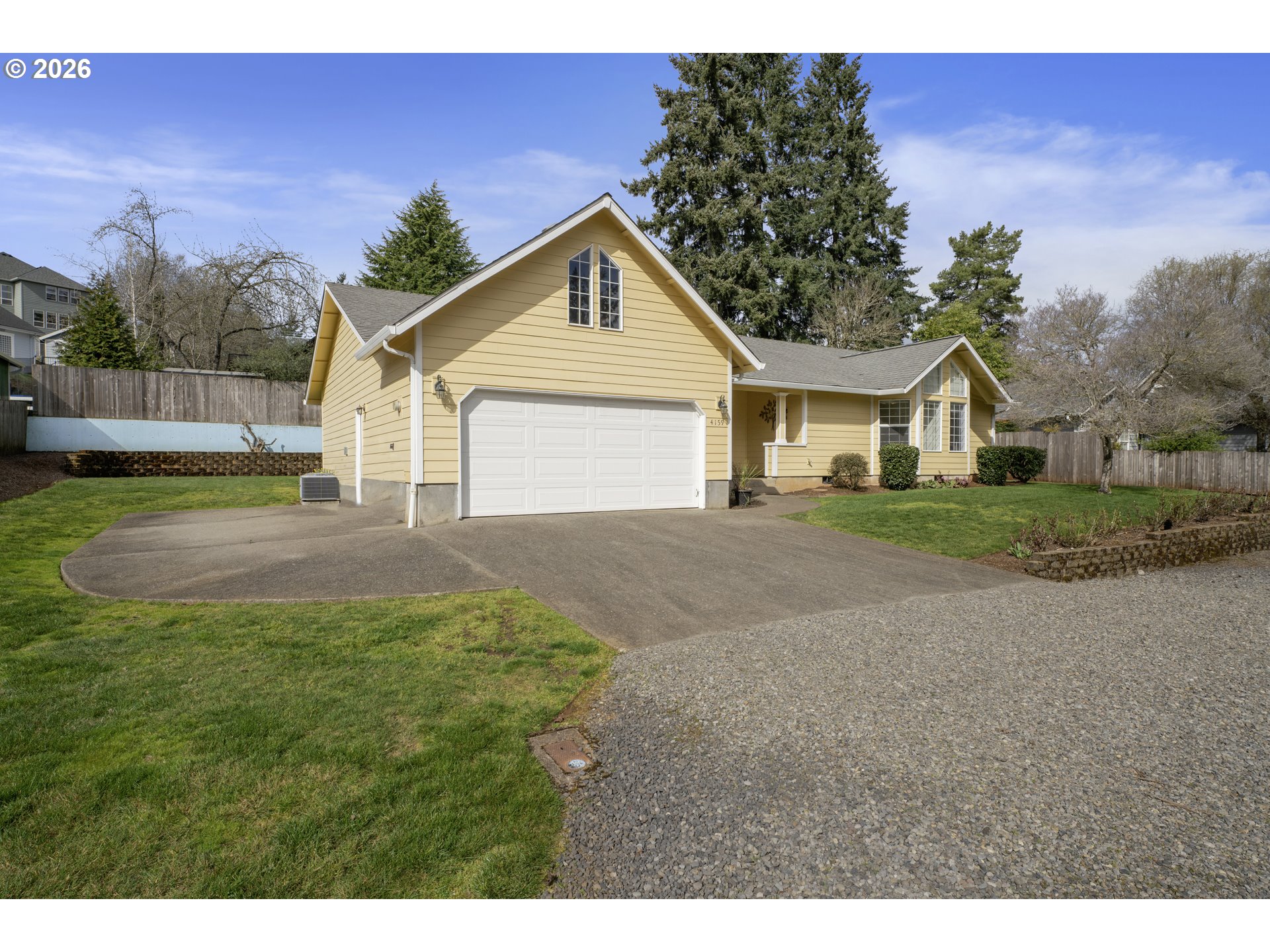 4159 Kurth Street South Salem, OR 97302 - Photo 2 of 37 a front view of a house with a yard and garage