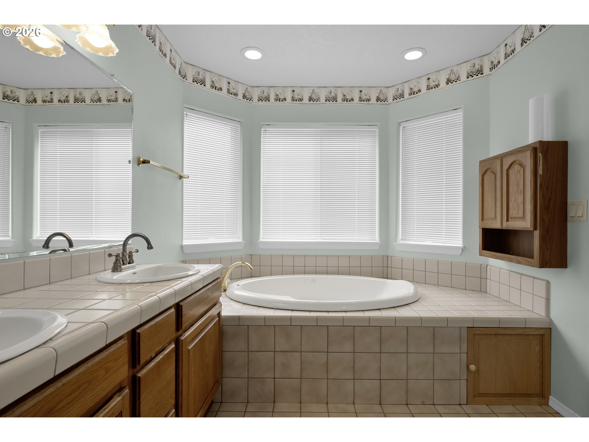 4159 Kurth Street South Salem, OR 97302 - Photo 21 of 37 a bathroom with a sink a toilet and mirror