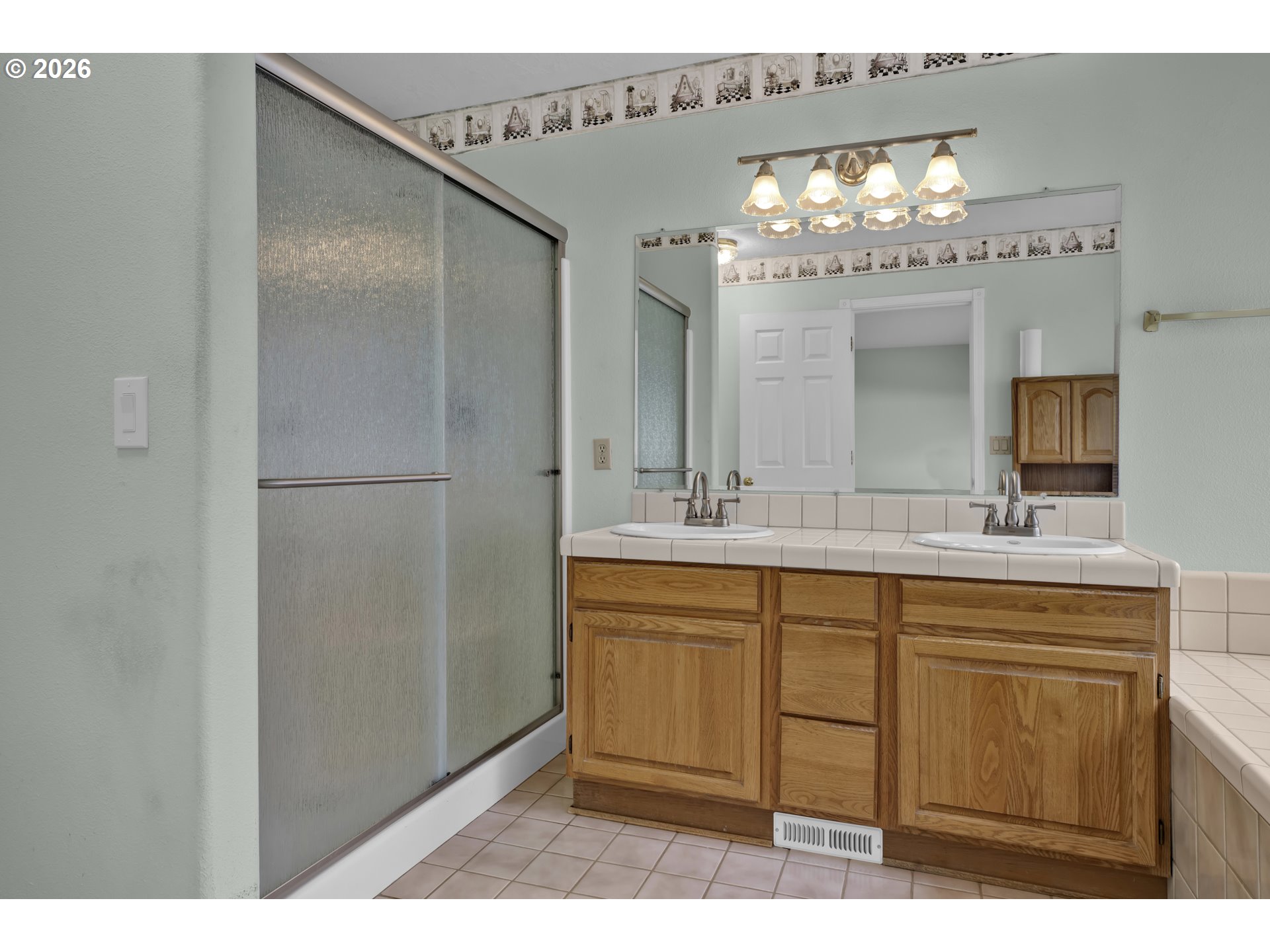 4159 Kurth Street South Salem, OR 97302 - Photo 22 of 37 a bathroom with a sink and a mirror