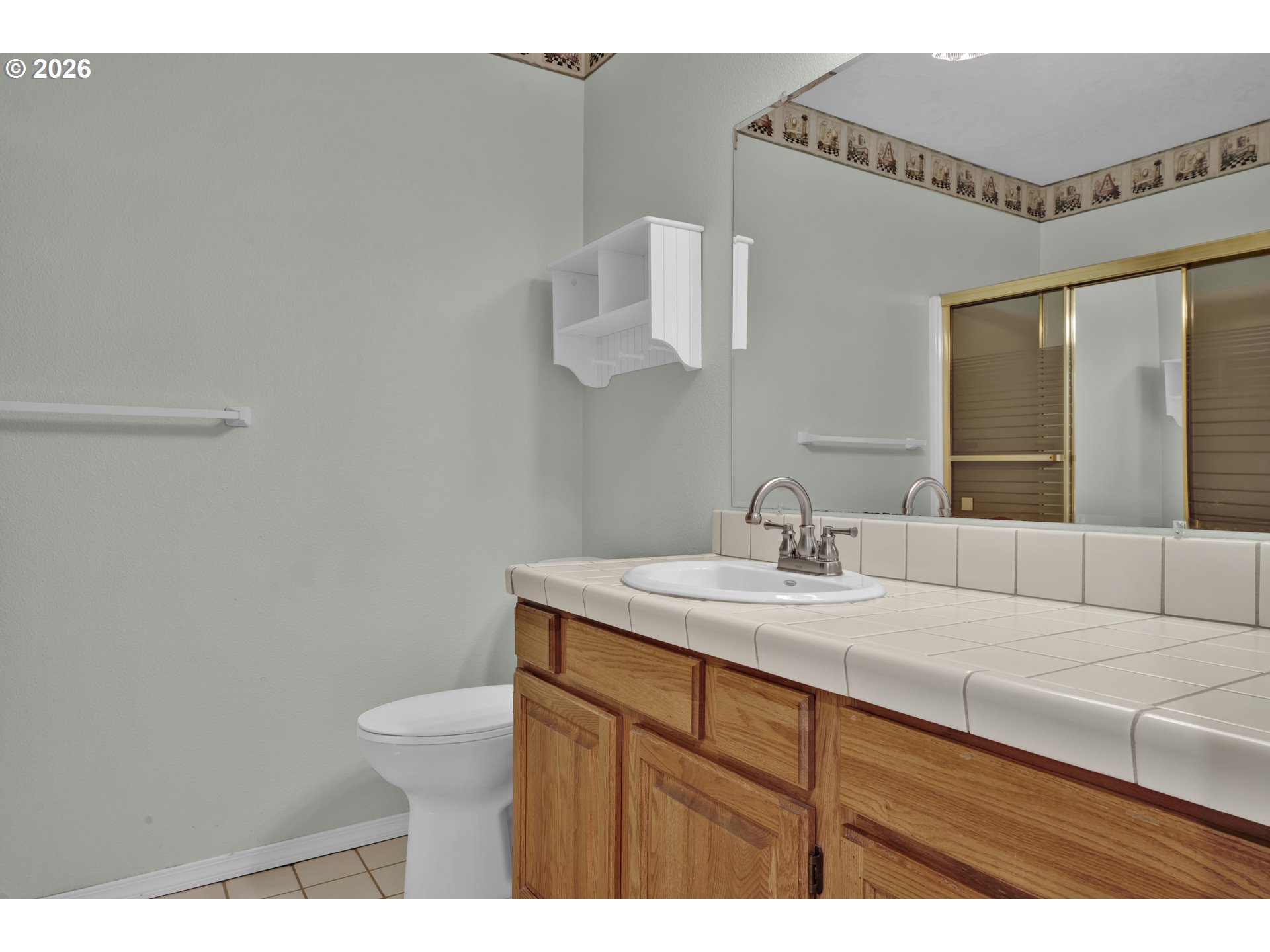 4159 Kurth Street South Salem, OR 97302 - Photo 29 of 37 a bathroom with a sink and a mirror