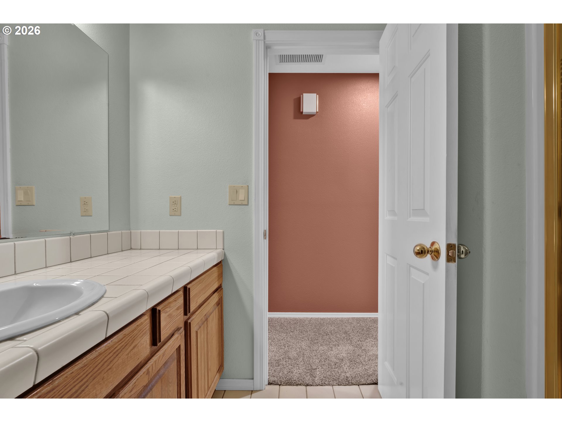 4159 Kurth Street South Salem, OR 97302 - Photo 30 of 37 a bathroom with a granite countertop sink and a mirror