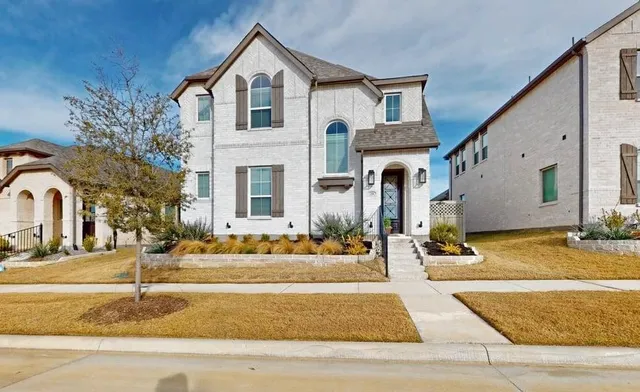 a front view of a house with street