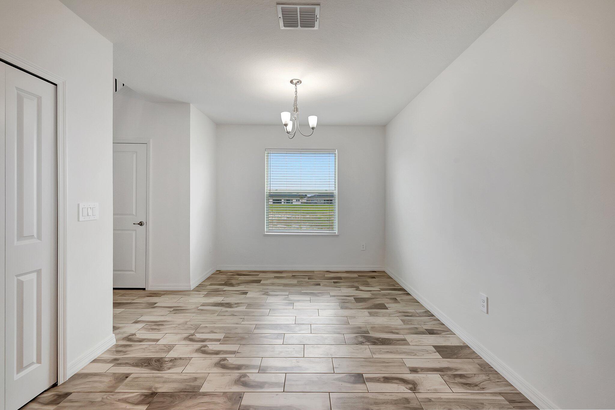 9398 Serapis Way Port St. Lucie, FL 34987 - Photo 12 of 50 a view of an empty room