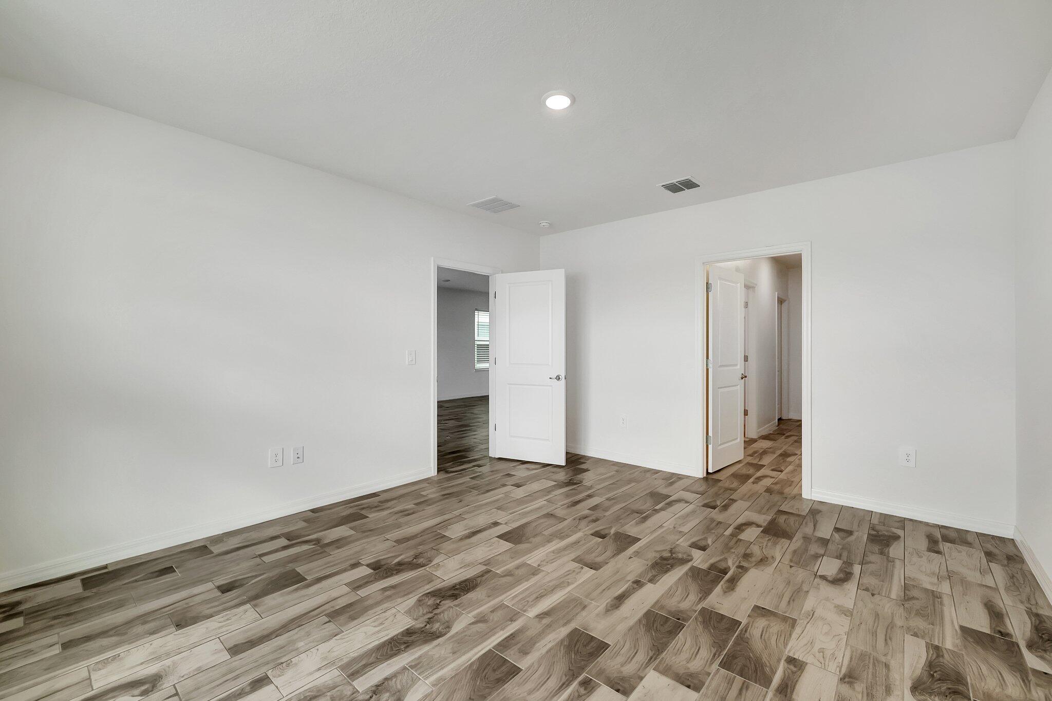 9398 Serapis Way Port St. Lucie, FL 34987 - Photo 16 of 50 a view of an empty room