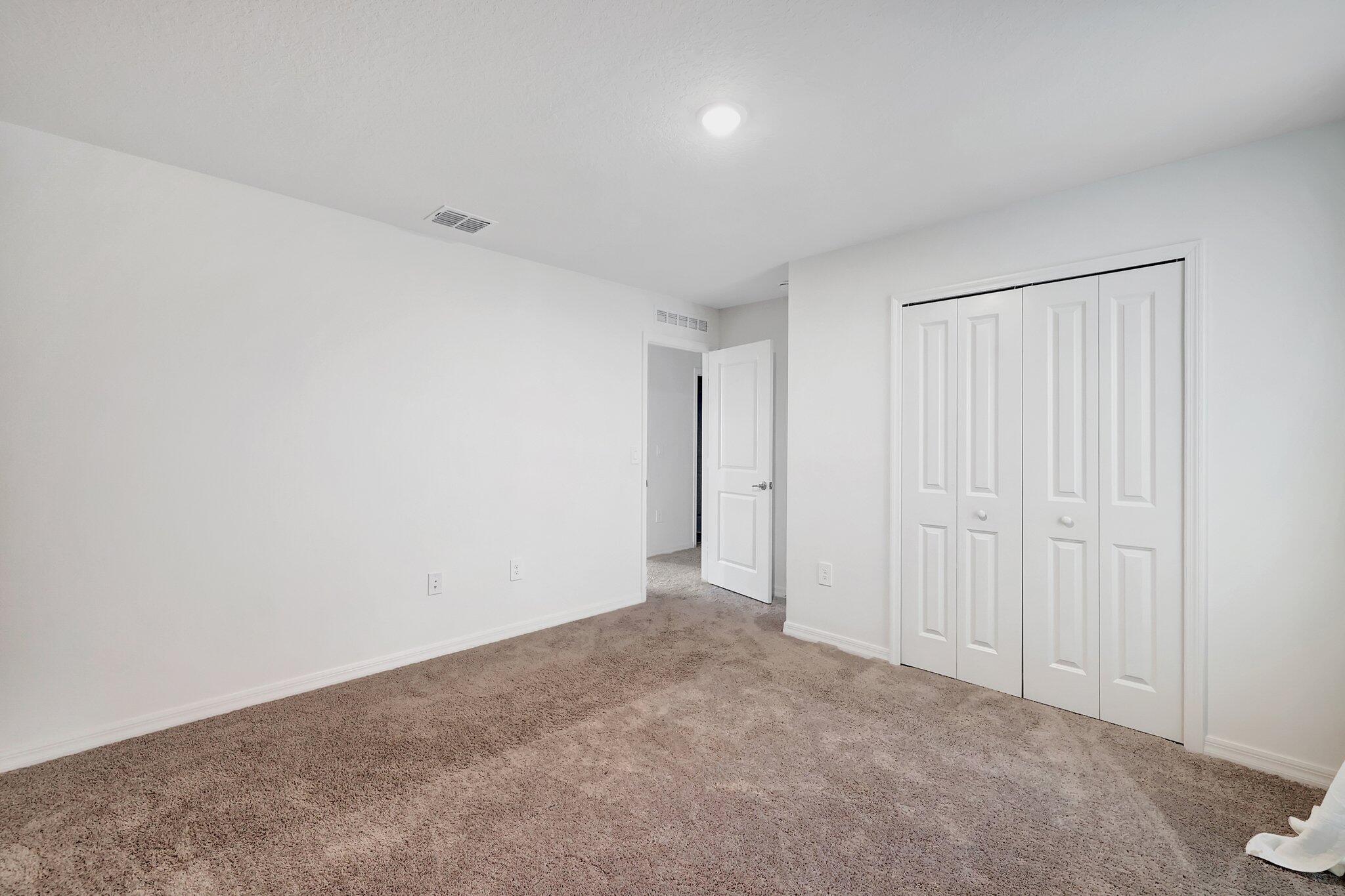 9398 Serapis Way Port St. Lucie, FL 34987 - Photo 22 of 50 a view of an empty room