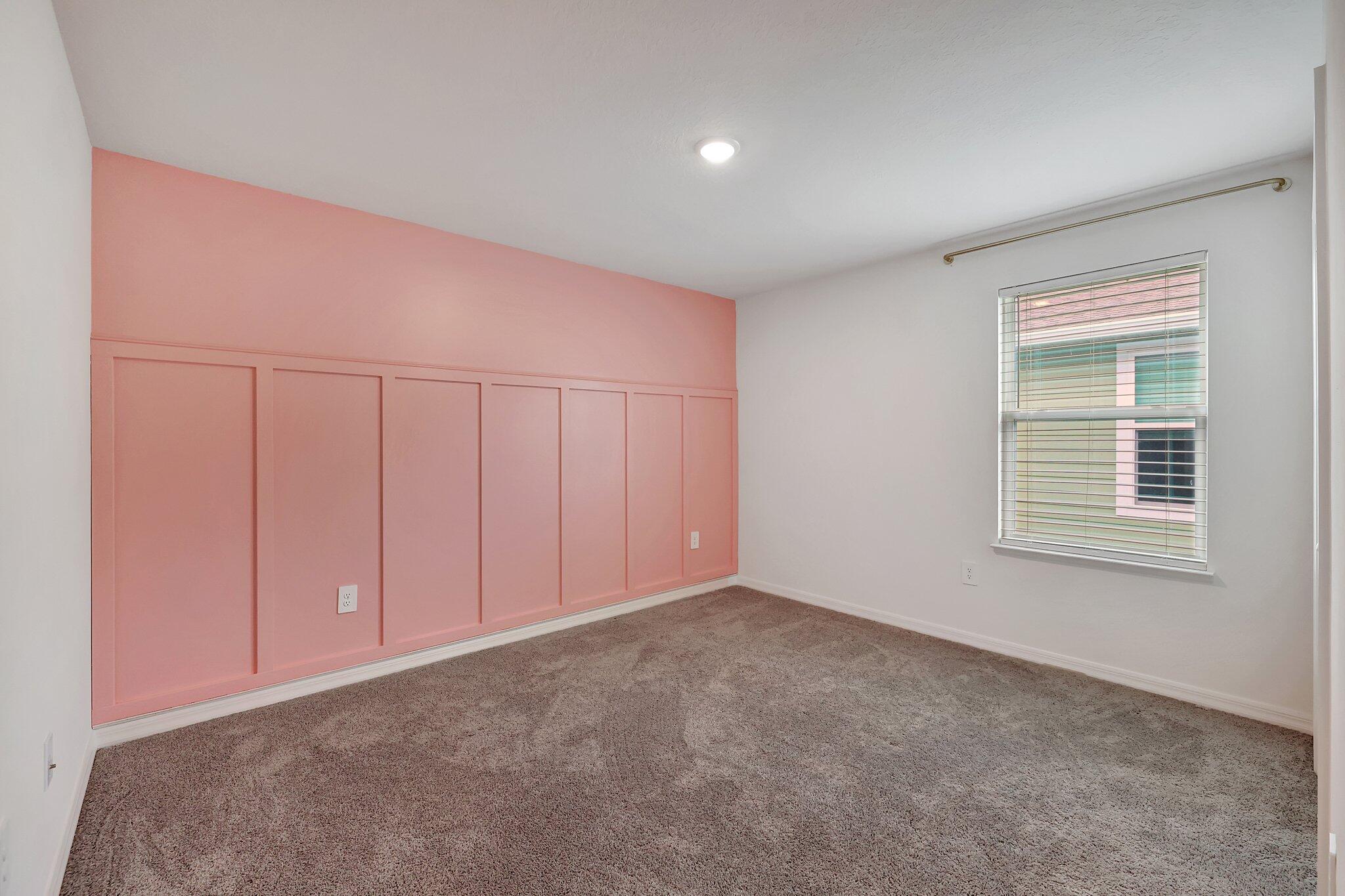 9398 Serapis Way Port St. Lucie, FL 34987 - Photo 25 of 50 a view of an empty room with a window