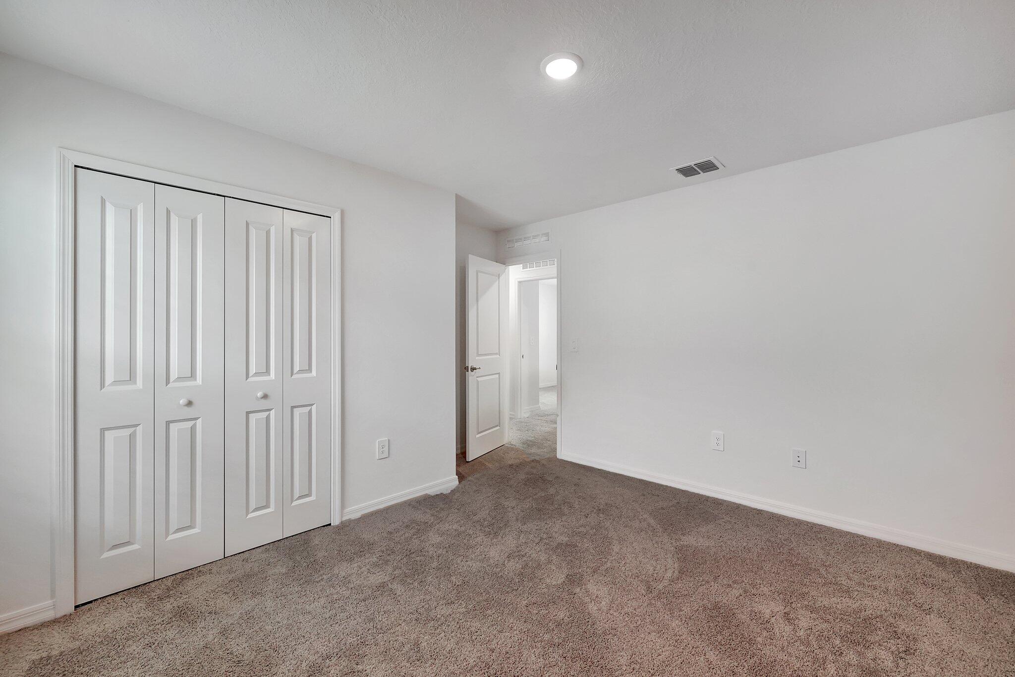 9398 Serapis Way Port St. Lucie, FL 34987 - Photo 26 of 50 a view of an empty room