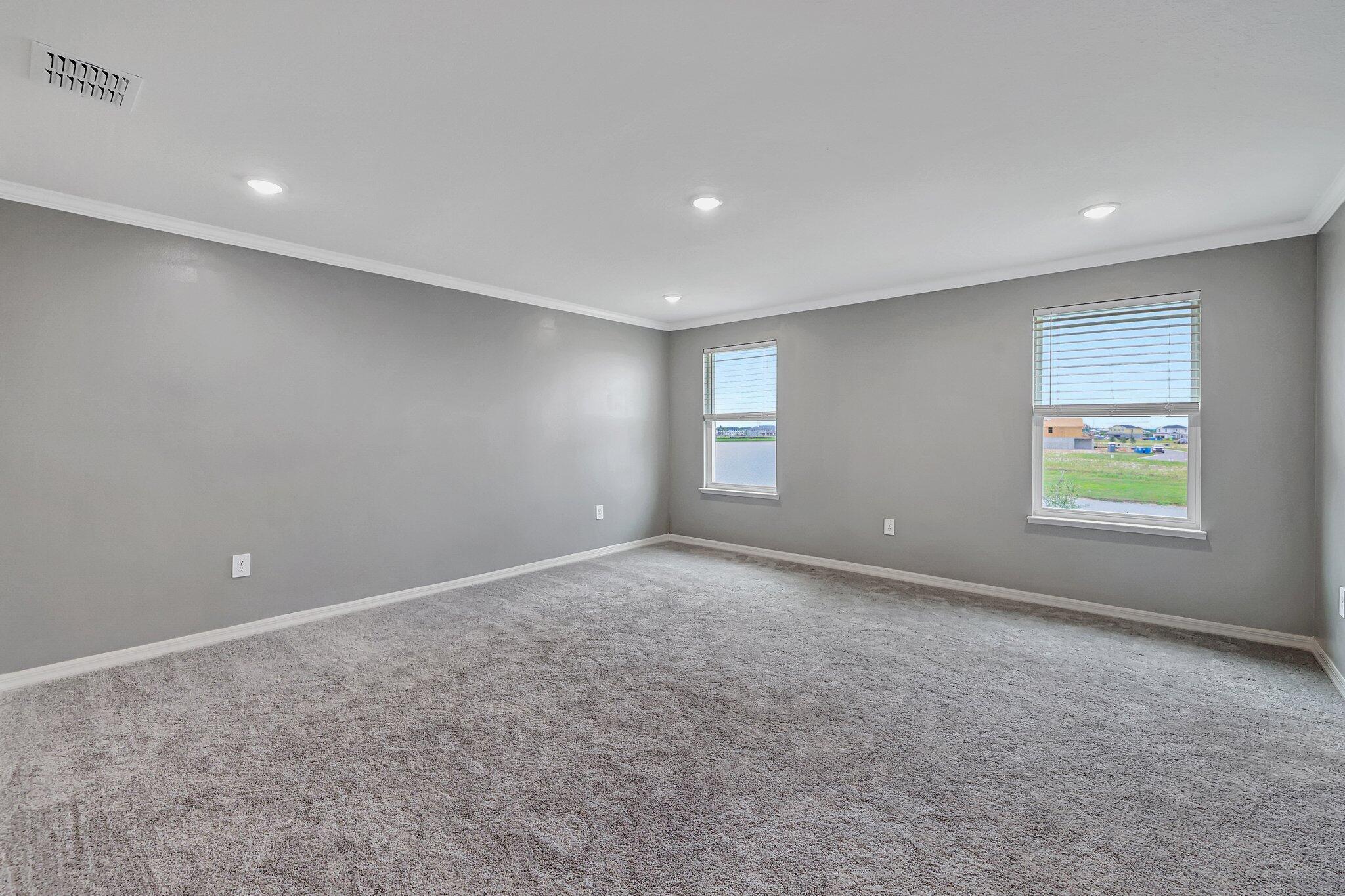 9398 Serapis Way Port St. Lucie, FL 34987 - Photo 29 of 50 an empty room with windows