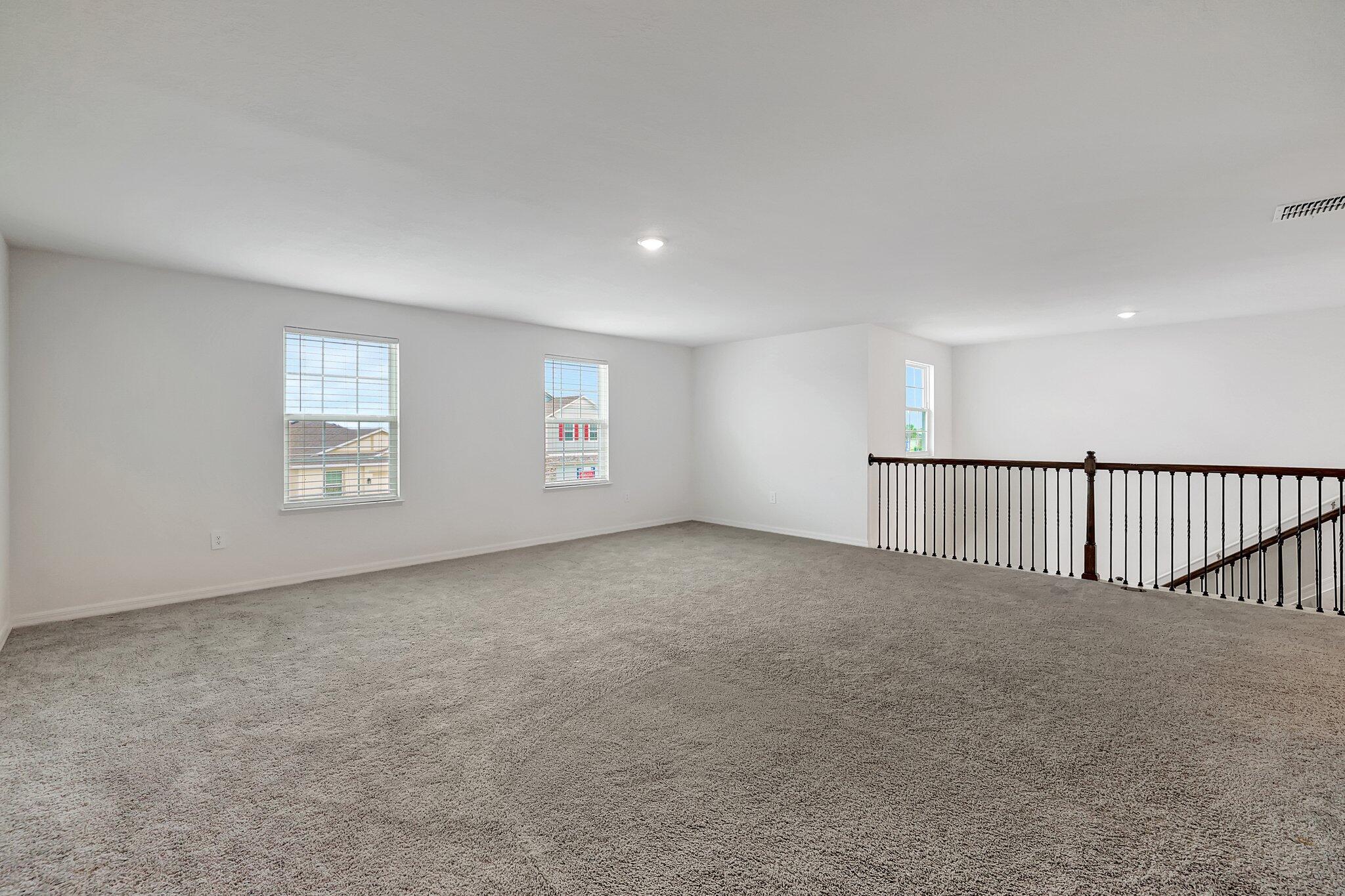 9398 Serapis Way Port St. Lucie, FL 34987 - Photo 41 of 50 a view of an empty room with a window