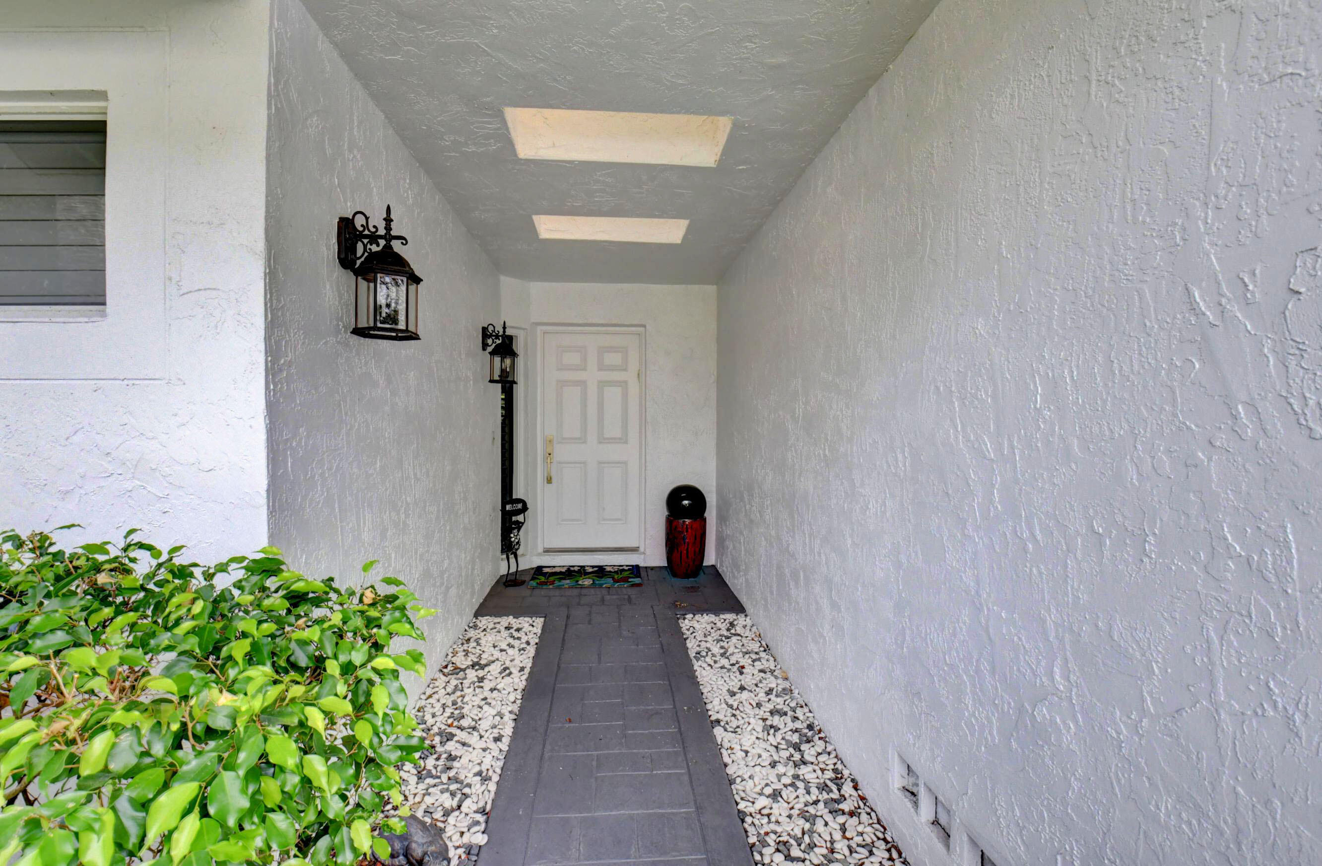 2232 Northwest 52nd Street Boca Raton, FL 33496 - Photo 3 of 38 03_dsc_2448_49_50_51_52