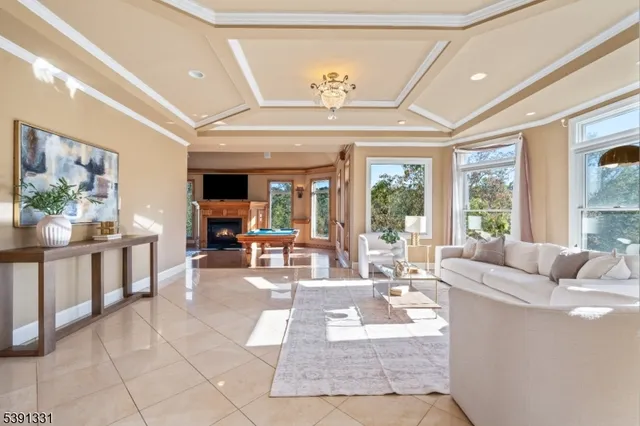a view of a backyard with table and chairs and potted plants