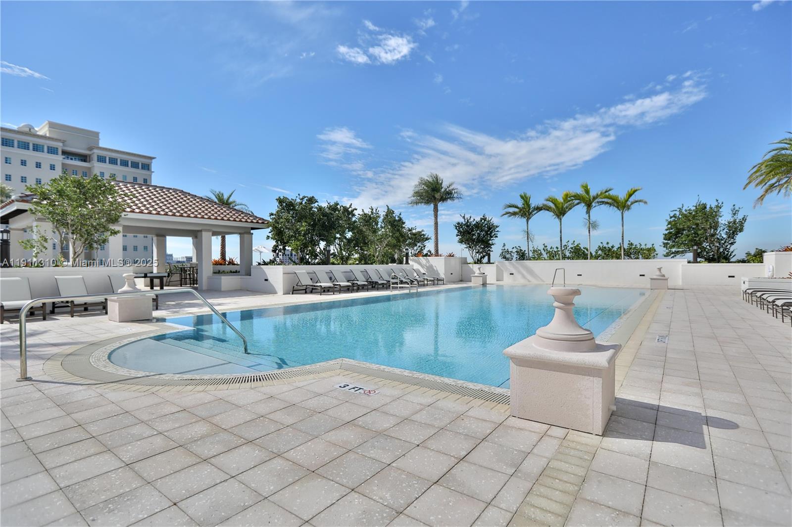2000 Salzedo Street, Unit 512 Coral Gables, FL 33134 - Photo 15 of 17 a view of a patio with couches and potted plants