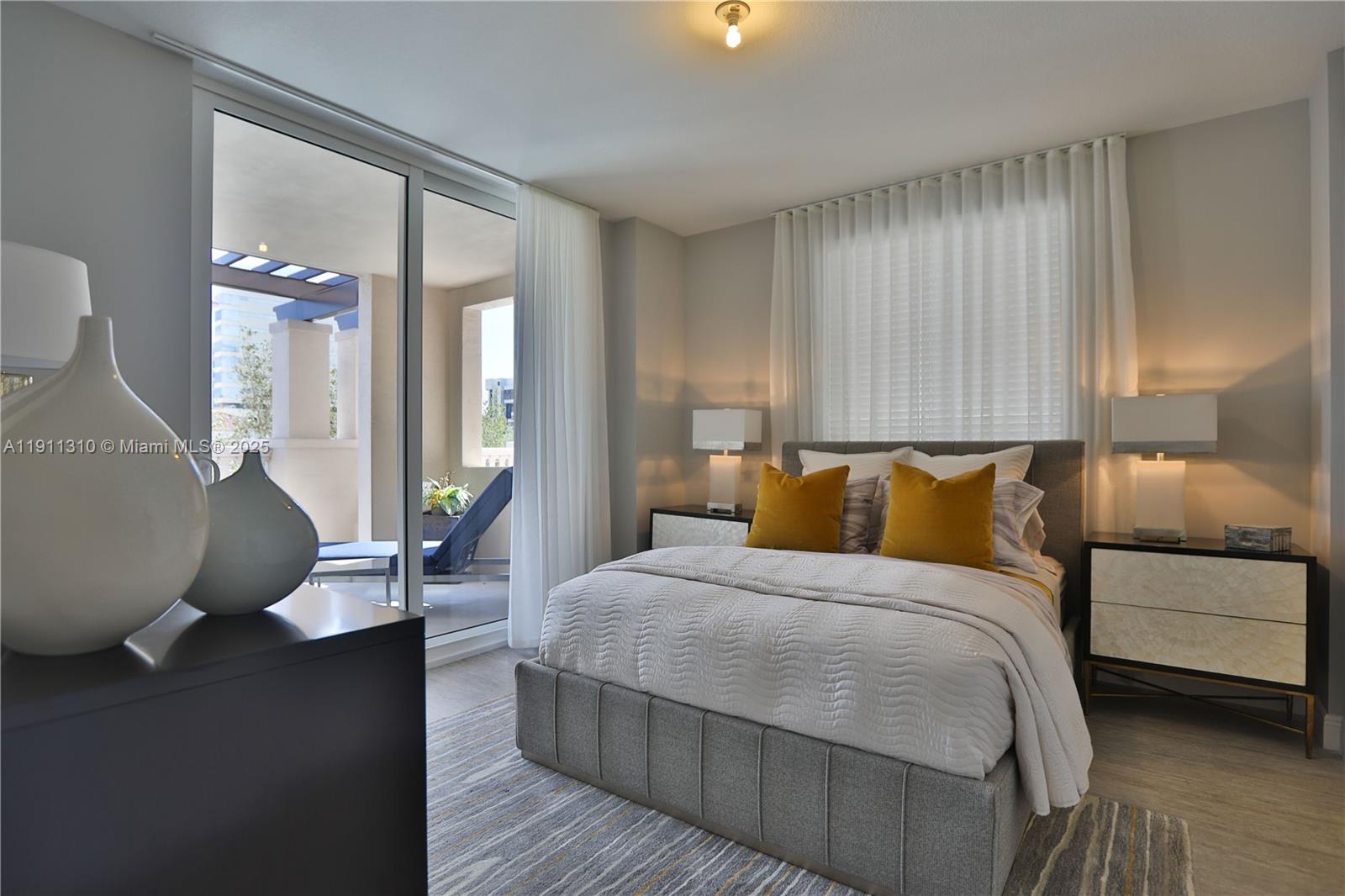 2000 Salzedo Street, Unit 512 Coral Gables, FL 33134 - Photo 8 of 17 a bedroom with a bed and window