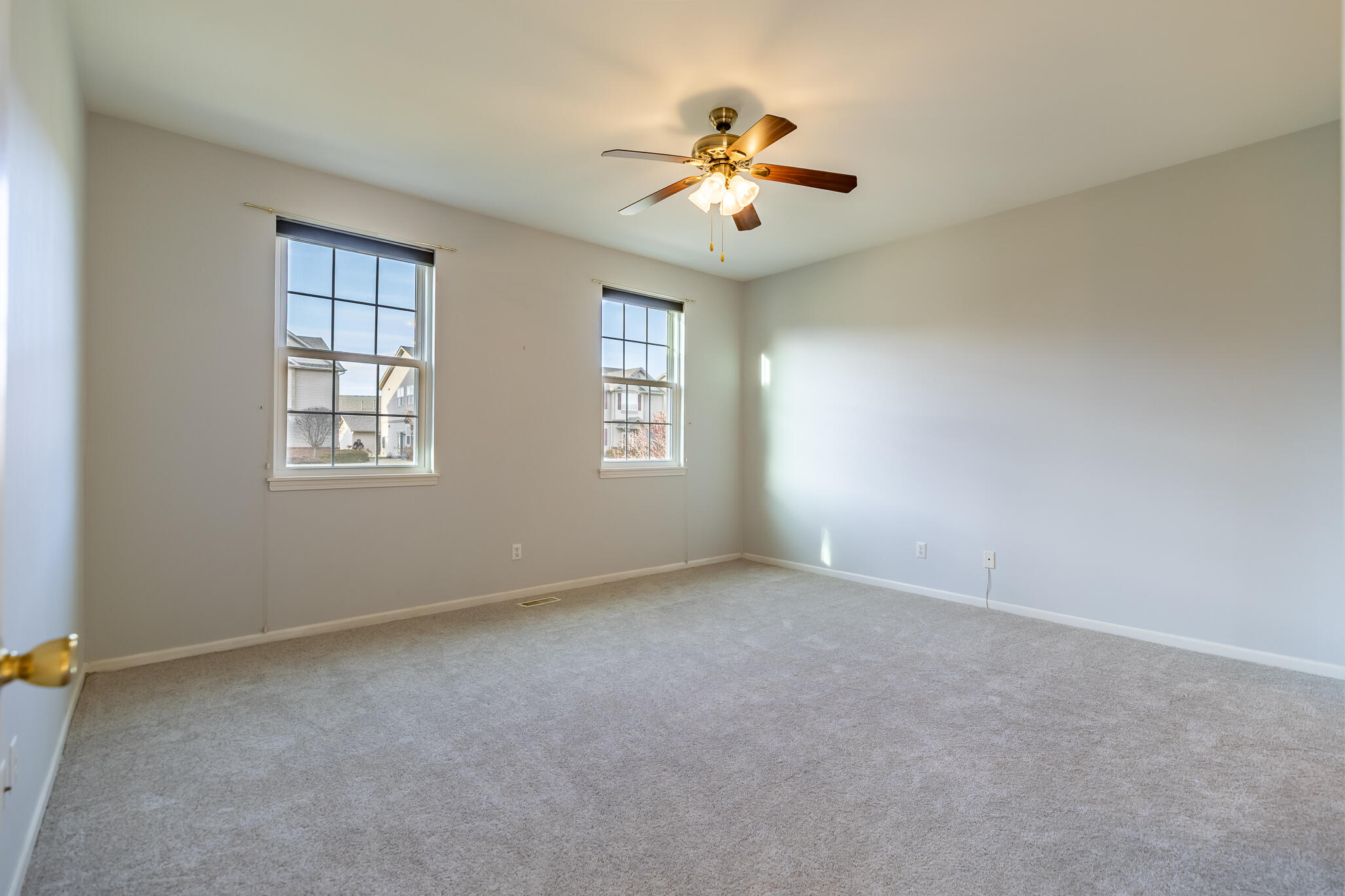 1253 Primrose Lane Schererville, IN 46375 - Photo 17 of 19 a view of an empty room with a window