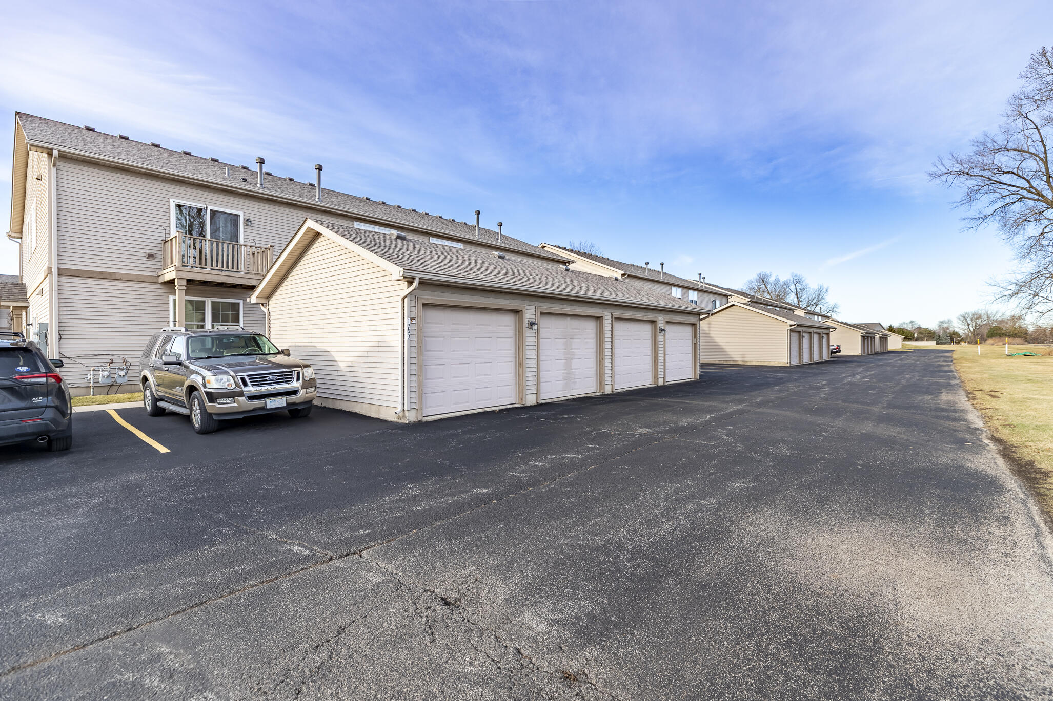 1253 Primrose Lane Schererville, IN 46375 - Photo 19 of 19 a view of a car park in front of house