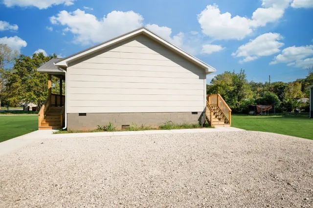 a house view with a garden space