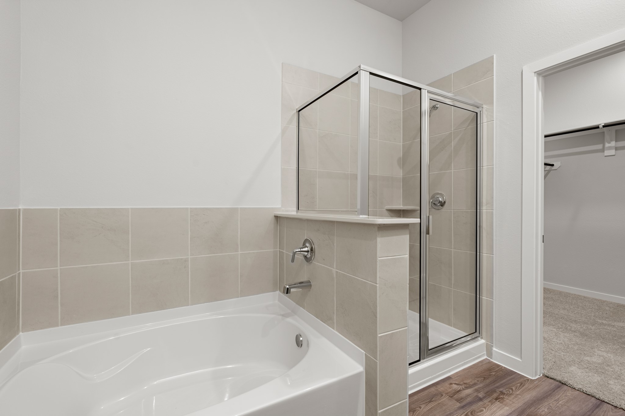 641 Pomegranate Lane La Marque, TX 77568 - Photo 12 of 22 a bathroom with a bathtub and a shower