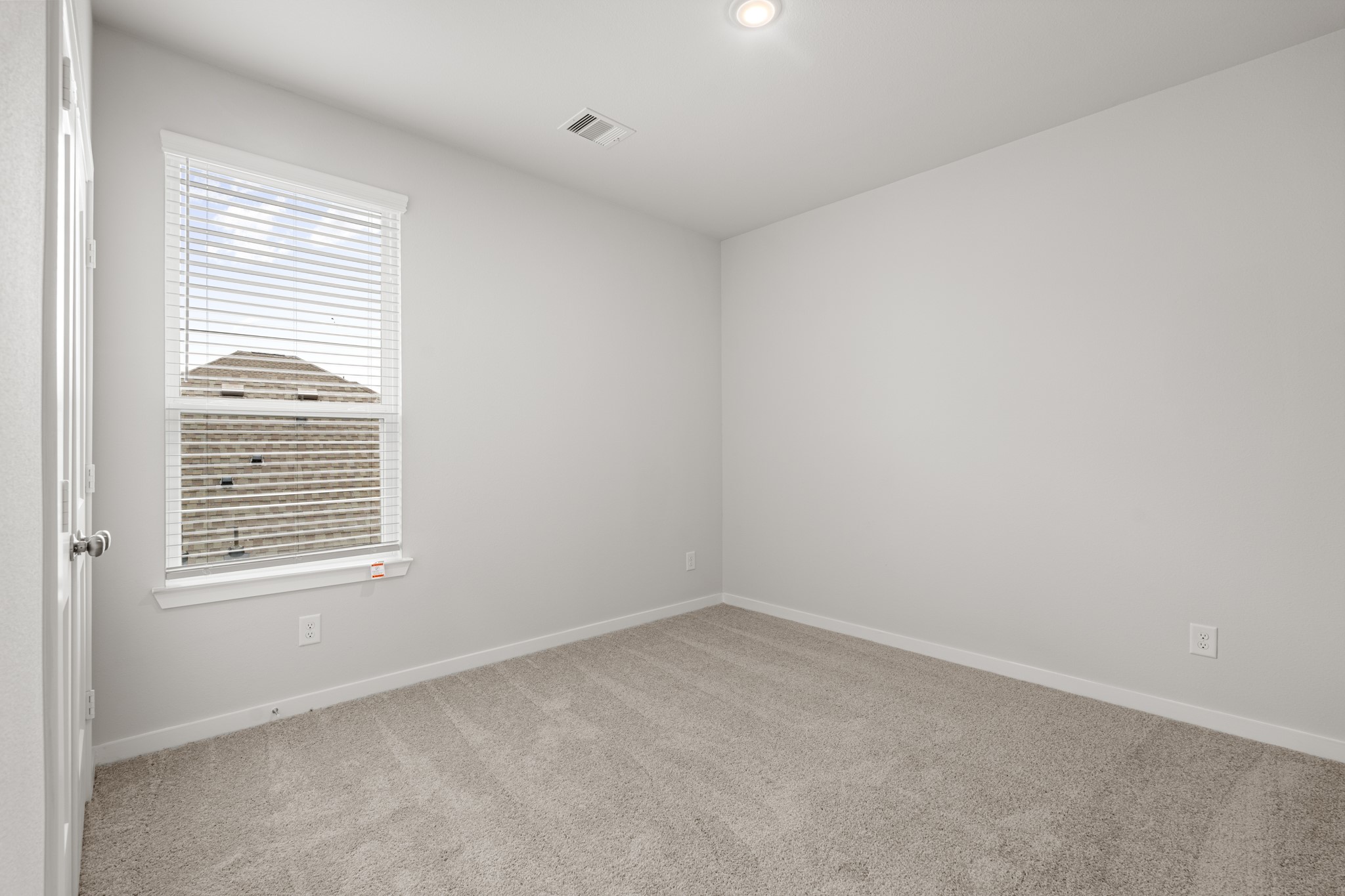 641 Pomegranate Lane La Marque, TX 77568 - Photo 15 of 22 an empty room with a window