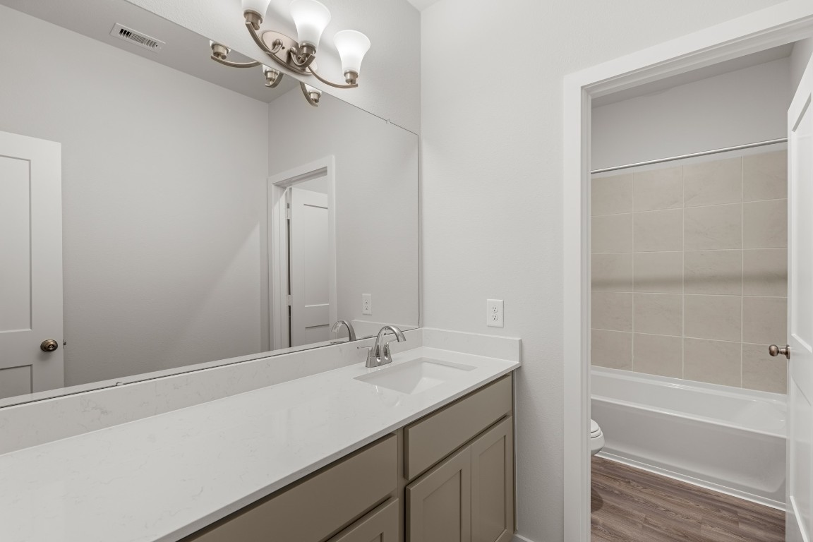 641 Pomegranate Lane La Marque, TX 77568 - Photo 17 of 22 a bathroom with a sink and a mirror