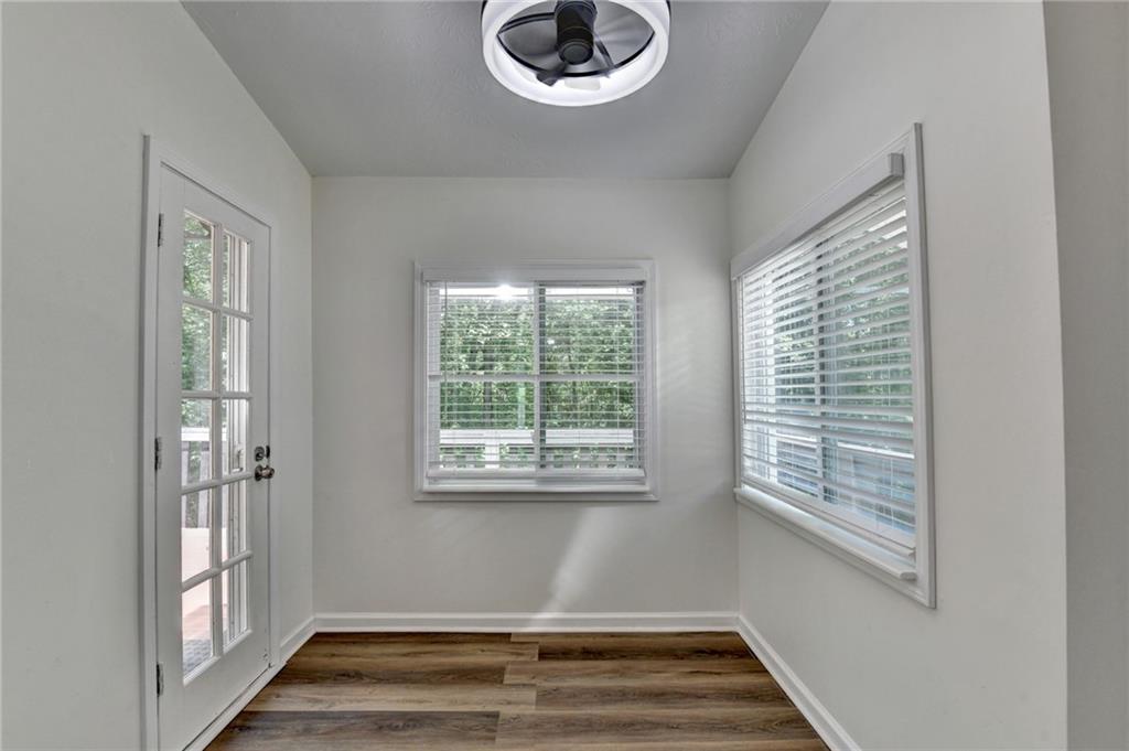 1530 Plunketts Road Buford, GA 30519 - Photo 28 of 54 a view of entryway with wooden floor and a window