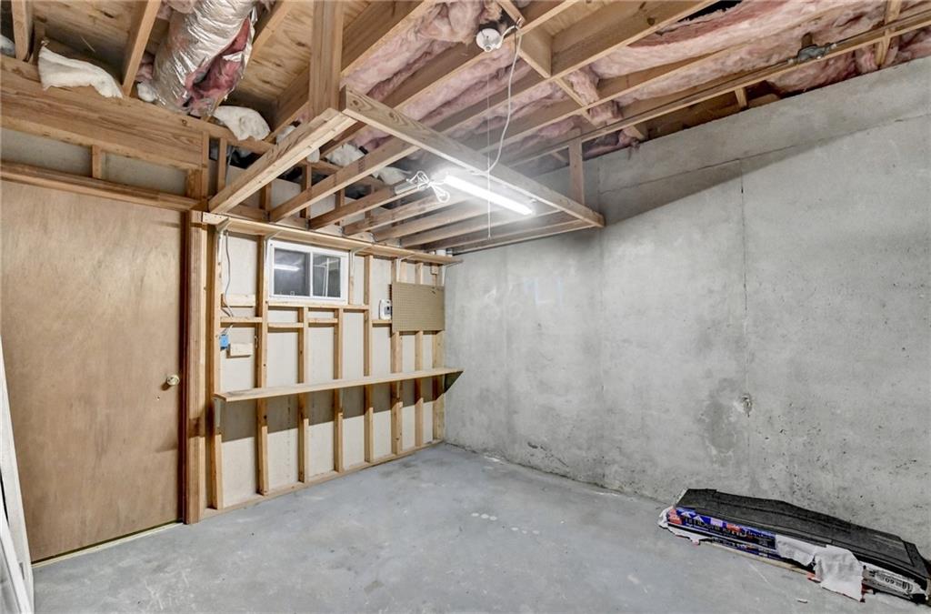 1530 Plunketts Road Buford, GA 30519 - Photo 48 of 54 a view of storage and utility room