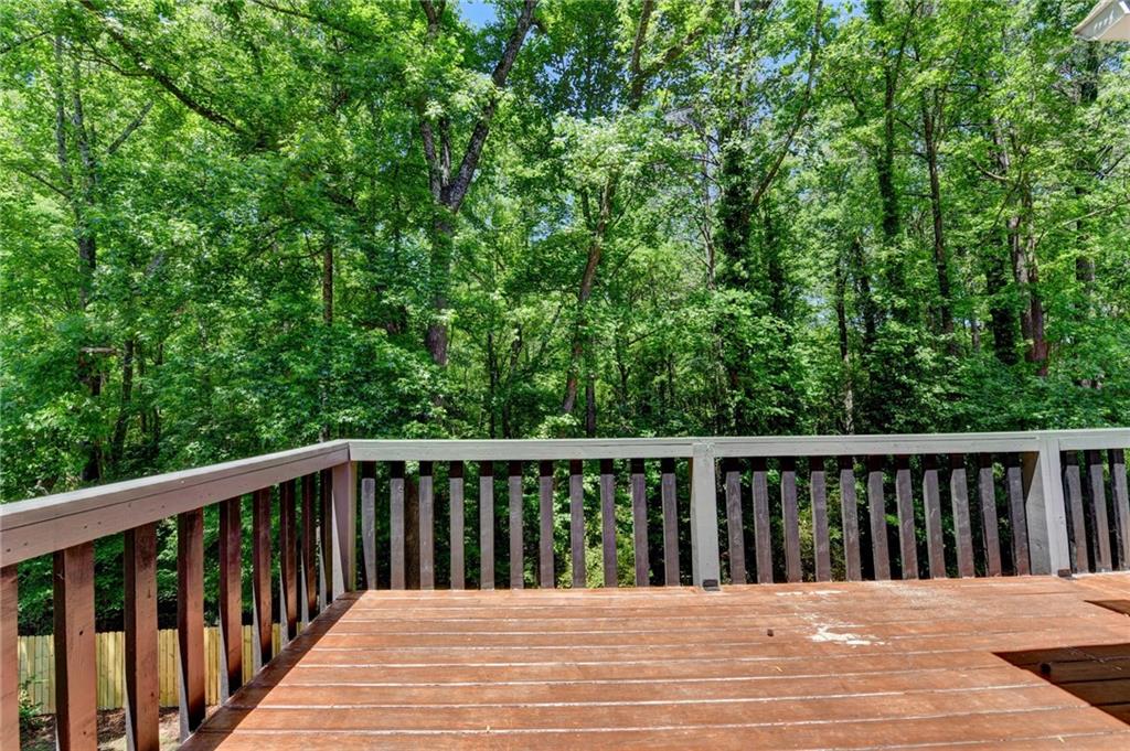 1530 Plunketts Road Buford, GA 30519 - Photo 50 of 54 a view of a wooden deck