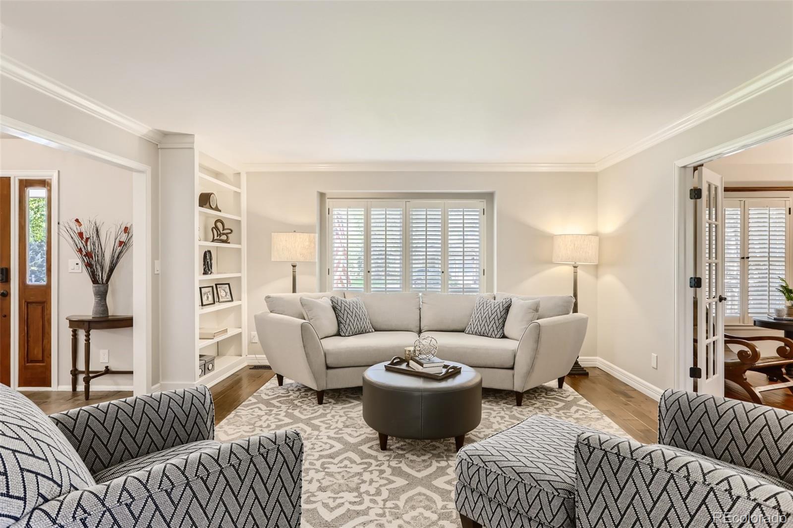 2185 Thistle Ridge Circle Highlands Ranch, CO 80126 - Photo 7 of 37 a living room with furniture or couch and a window