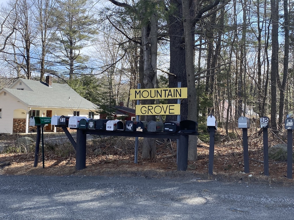 106 Shore Road Becket, MA 01223 - Photo 26 of 29 a view of a street with sitting area