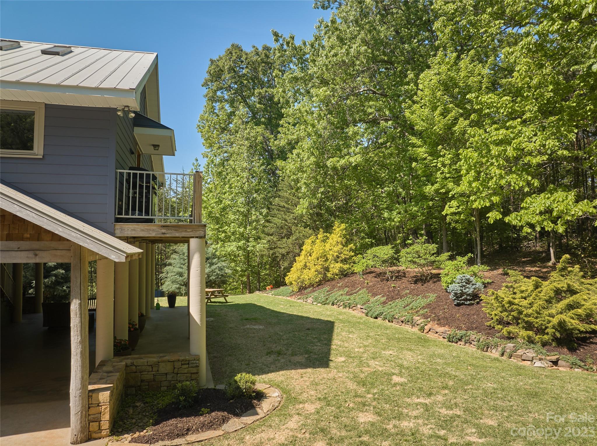 204 Hooker Road Tryon, NC 28782 - Photo 5 of 34 a view of a house with a yard