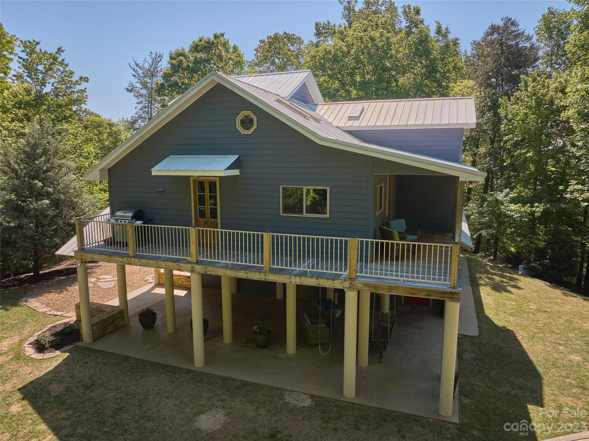 204 Hooker Road Tryon, NC 28782 - Photo 6 of 34 a view of house with outdoor space and sitting area