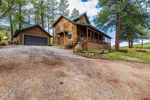 an aerial view of residential house with outdoor space