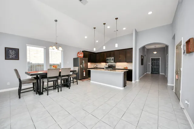 a view of a dining room and livingroom