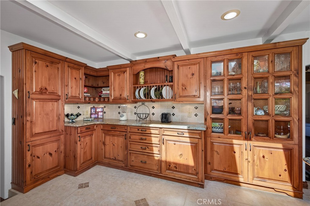 707 Wabash Avenue Redlands, CA 92374 - Photo 18 of 50 a kitchen with stainless steel appliances granite countertop a refrigerator and sink