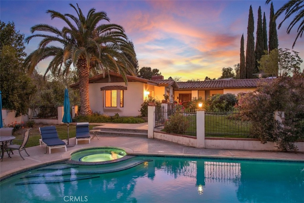 707 Wabash Avenue Redlands, CA 92374 - Photo 29 of 50 a view of a swimming pool with a patio and a yard