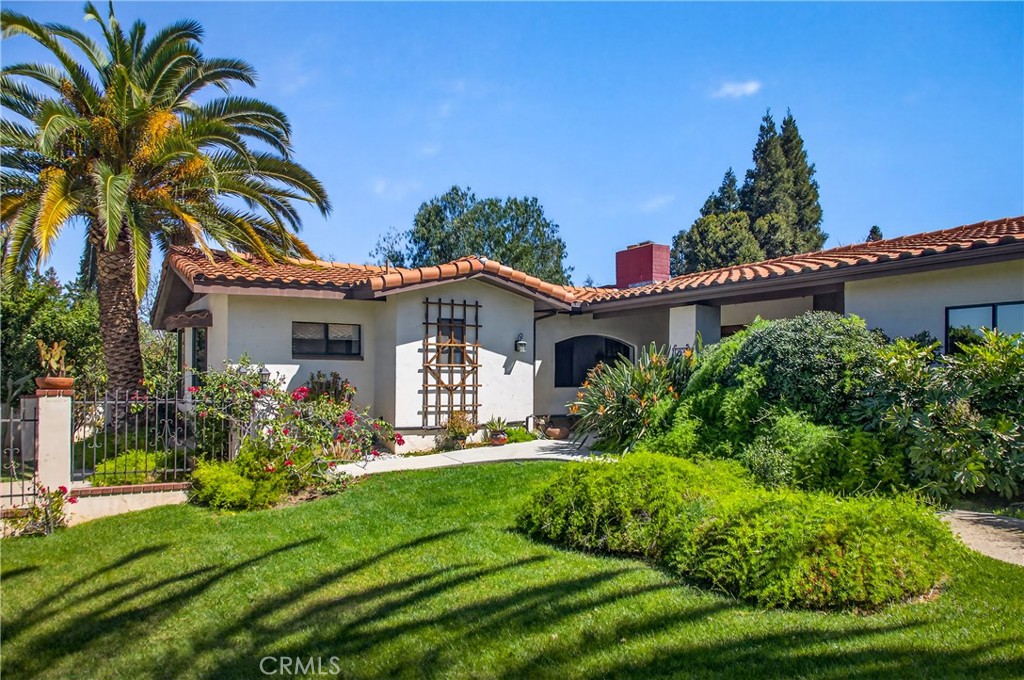 707 Wabash Avenue Redlands, CA 92374 - Photo 3 of 50 a front view of a house with a yard