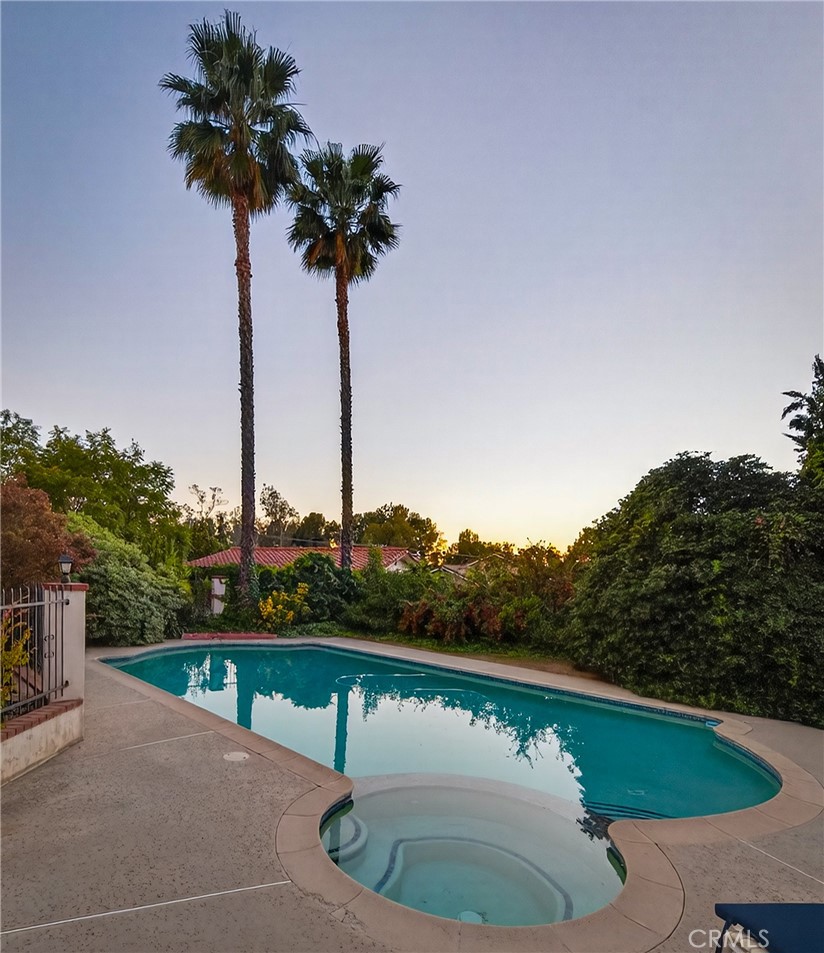 707 Wabash Avenue Redlands, CA 92374 - Photo 31 of 50 a view of a swimming pool and a terrace
