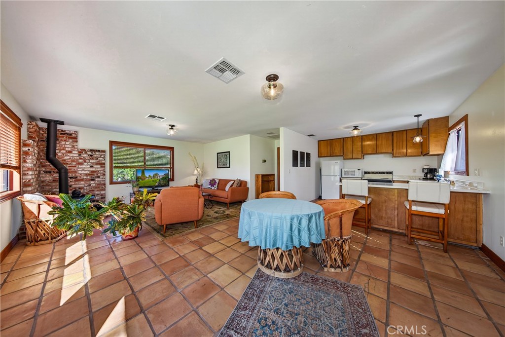 707 Wabash Avenue Redlands, CA 92374 - Photo 35 of 50 a living room with furniture and a large window