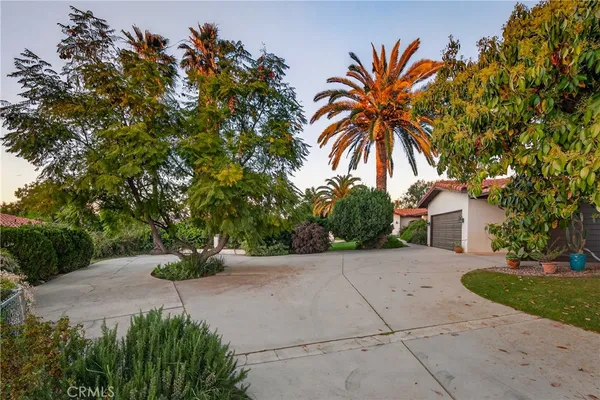 an aerial view of a house with a garden