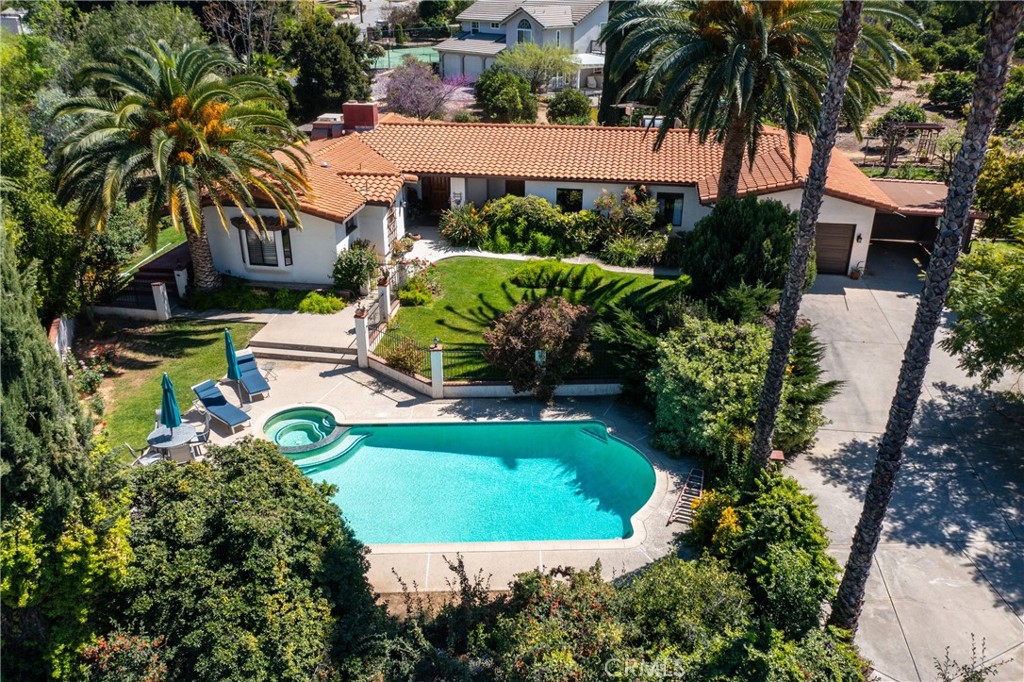 707 Wabash Avenue Redlands, CA 92374 - Photo 48 of 50 a view of a swimming pool with a garden