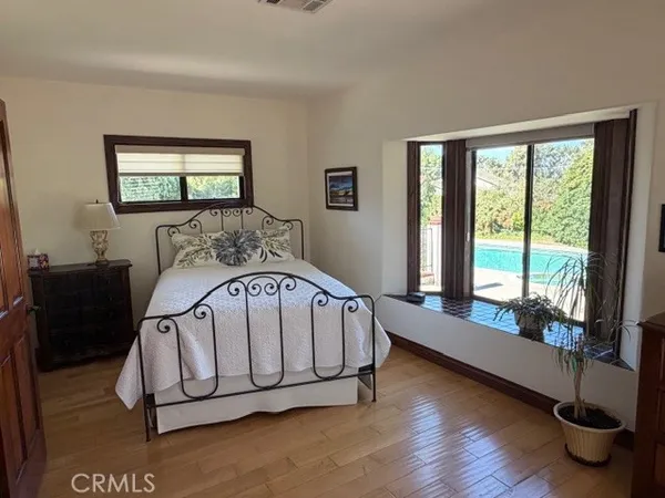 a room with gym equipment and a large window