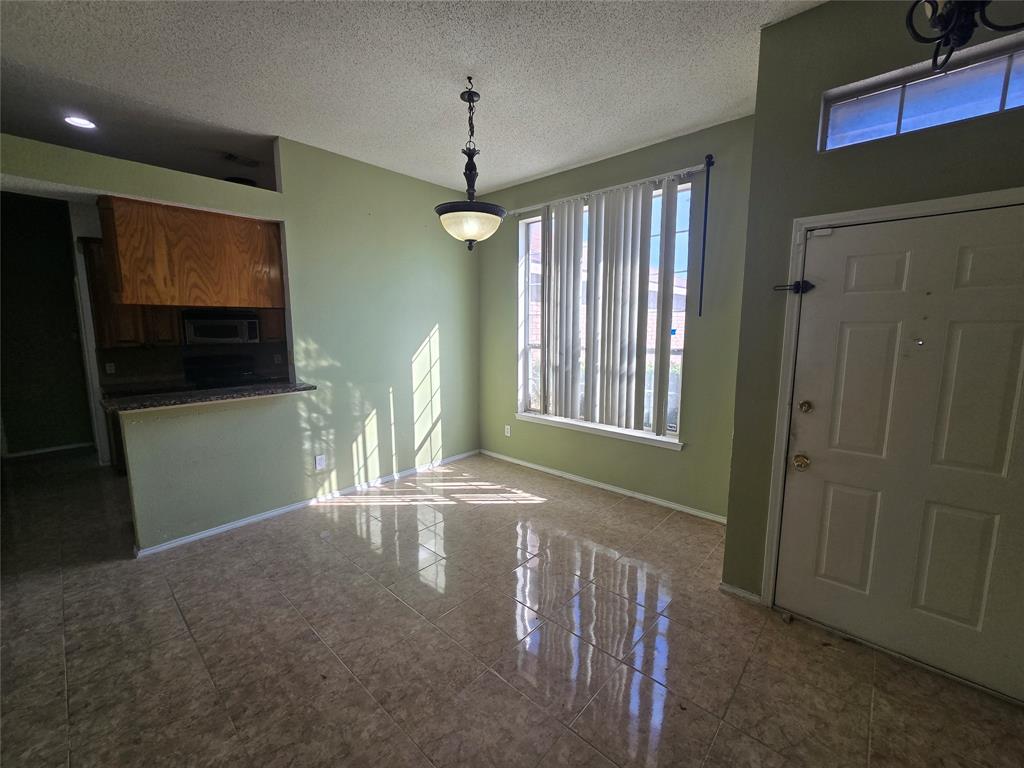 8012 Ashridge Road Fort Worth, TX 76134 - Photo 4 of 18 a view of livingroom with window