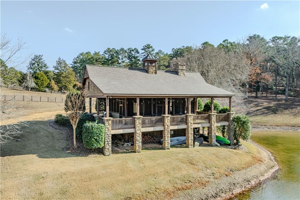 525 North River Road Northeast Rome, GA 30161 - Photo 101 of 101 an aerial view of a house with a yard and potted plants