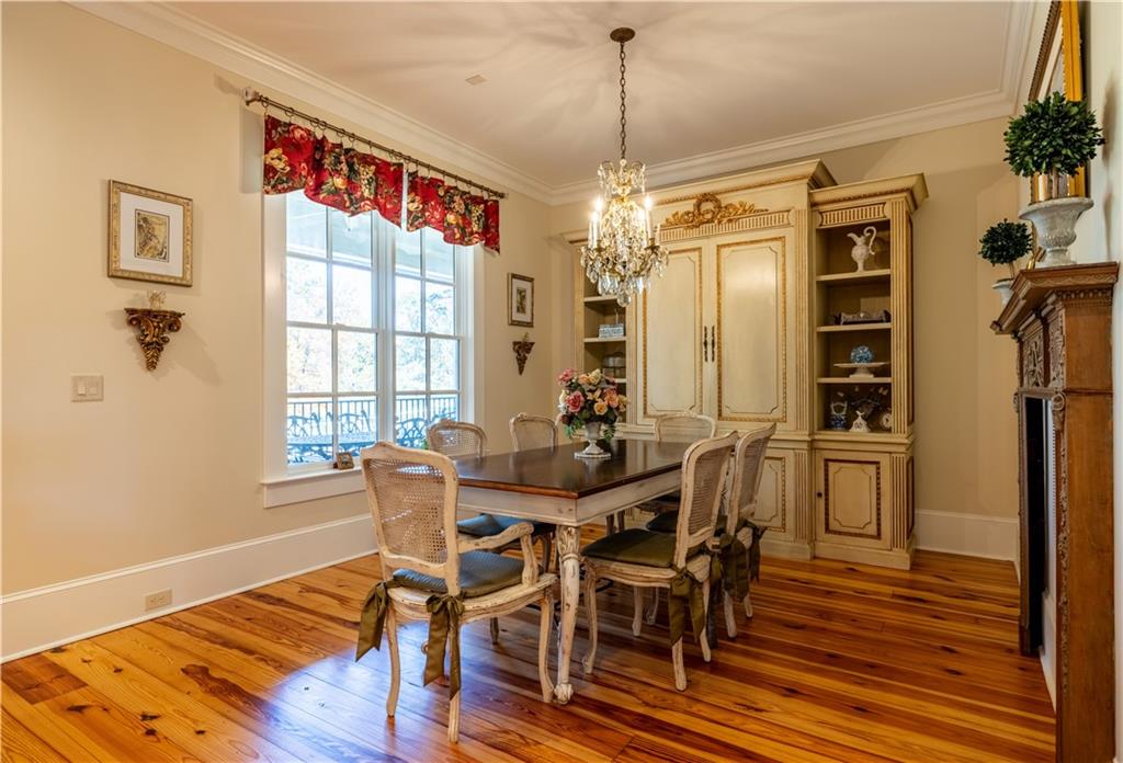 525 North River Road Northeast Rome, GA 30161 - Photo 19 of 101 a view of a dining room with furniture window and wooden floor