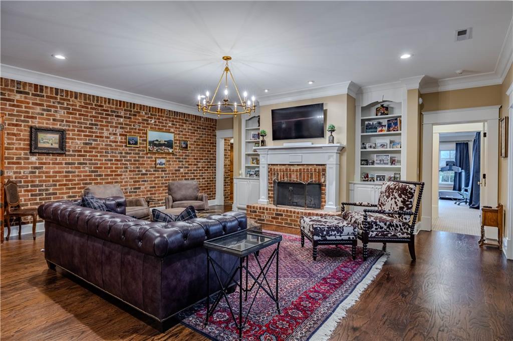 525 North River Road Northeast Rome, GA 30161 - Photo 53 of 101 a living room with furniture and a fireplace