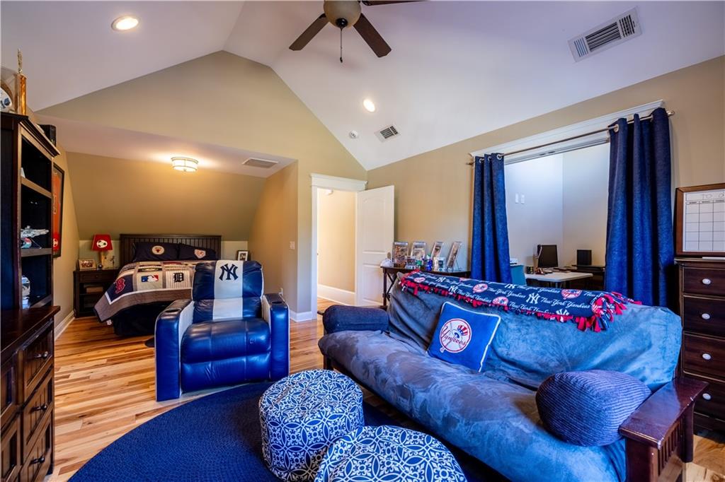 525 North River Road Northeast Rome, GA 30161 - Photo 72 of 101 a living room with furniture and a flat screen tv