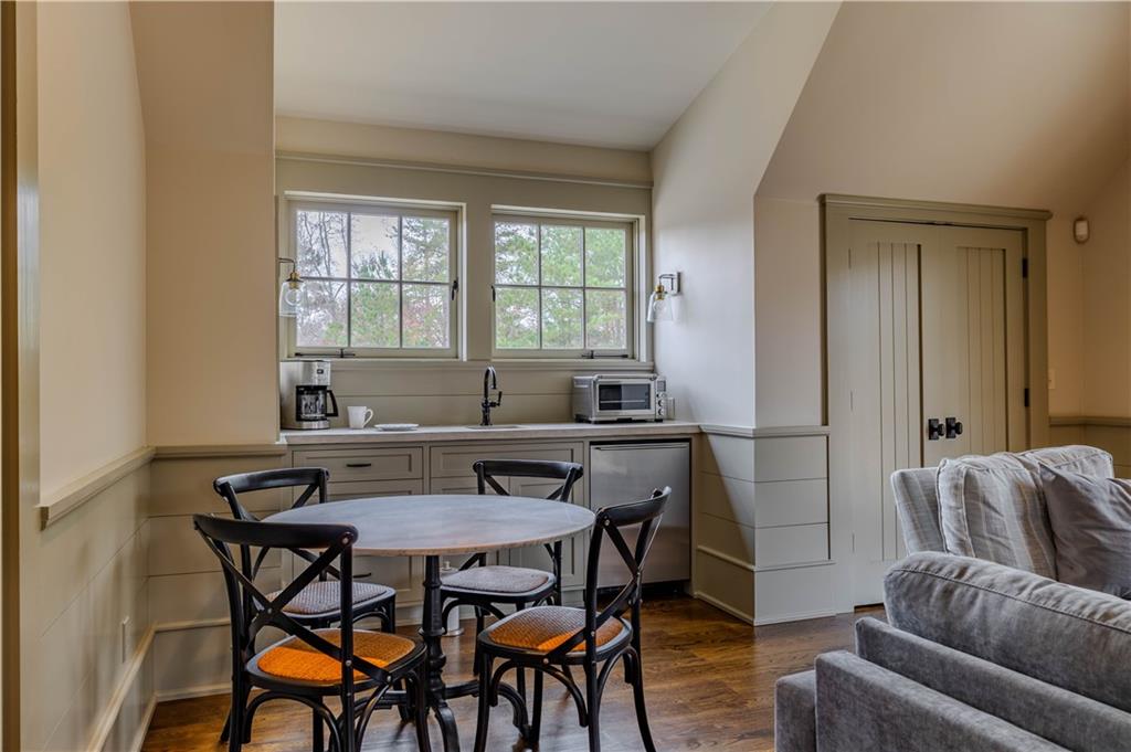 525 North River Road Northeast Rome, GA 30161 - Photo 89 of 101 a view of a dining room with furniture and wooden floor