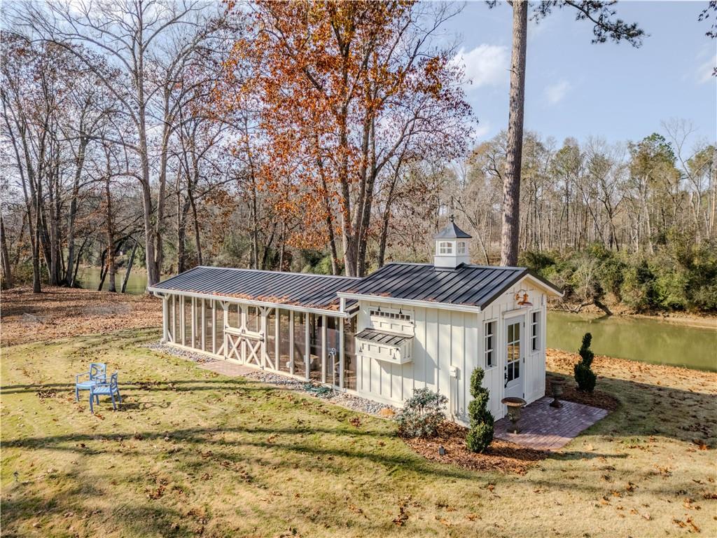 525 North River Road Northeast Rome, GA 30161 - Photo 9 of 101 a view of a house with backyard