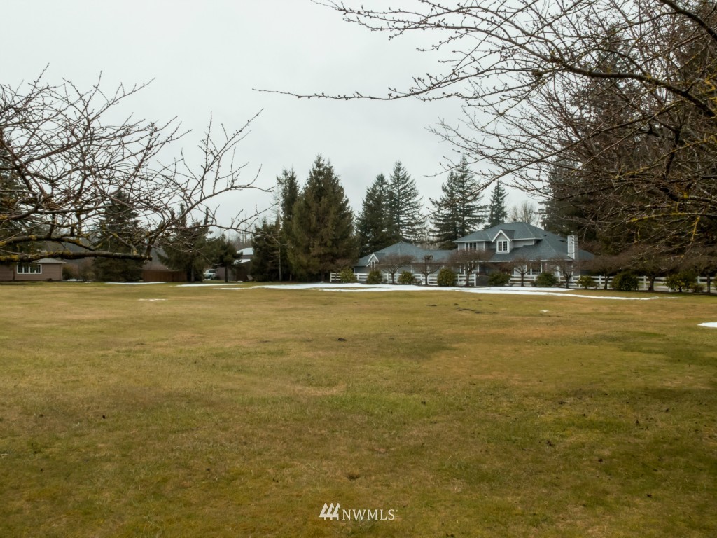 8131 North Telegraph Road Everson, WA 98247 - Photo 22 of 24 a view of outdoor space with swimming pool and green space