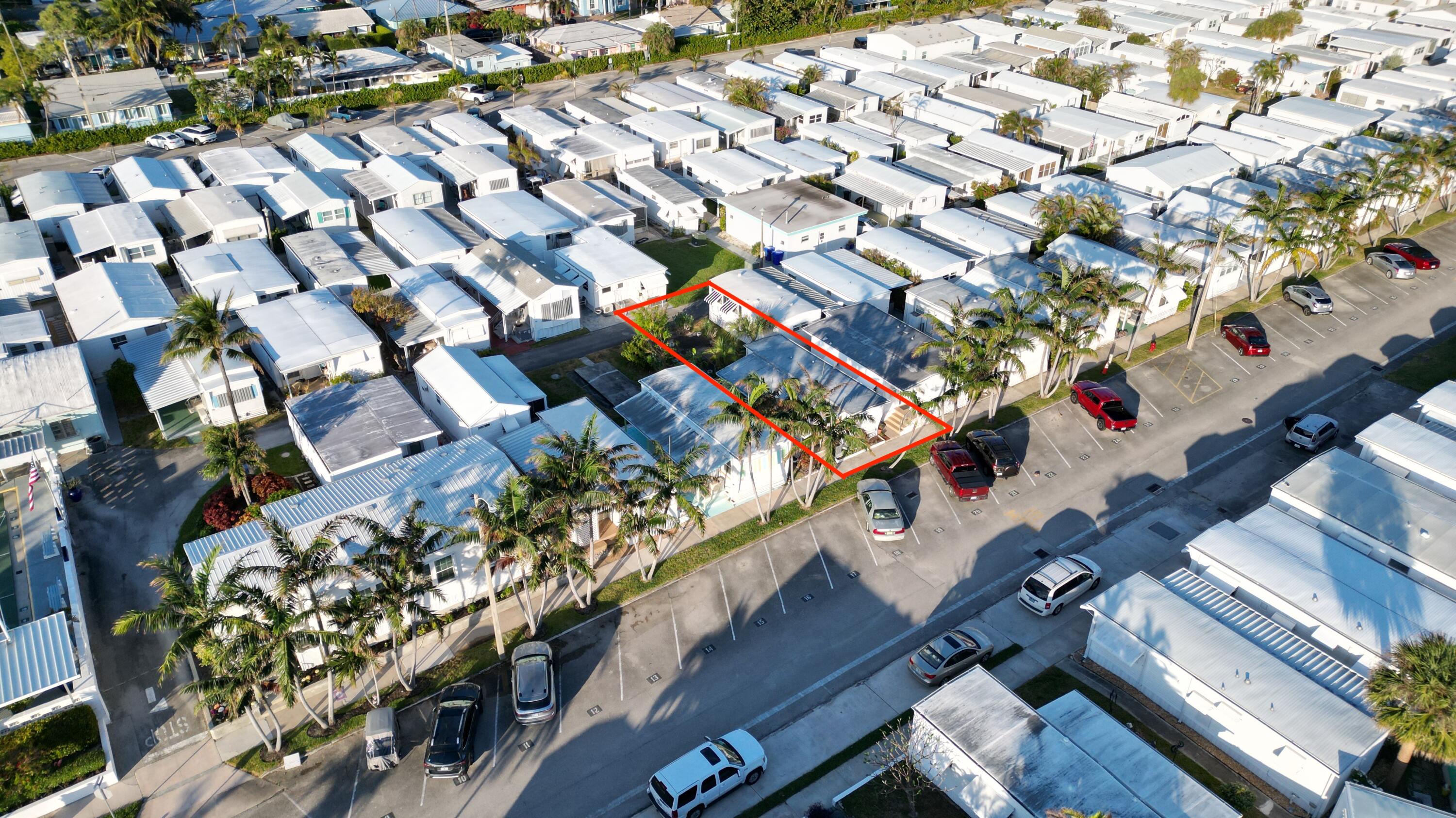 21 Ruthmary Avenue, Unit G Briny Breezes, FL 33435 - Photo 2 of 15 a city view with tall buildings